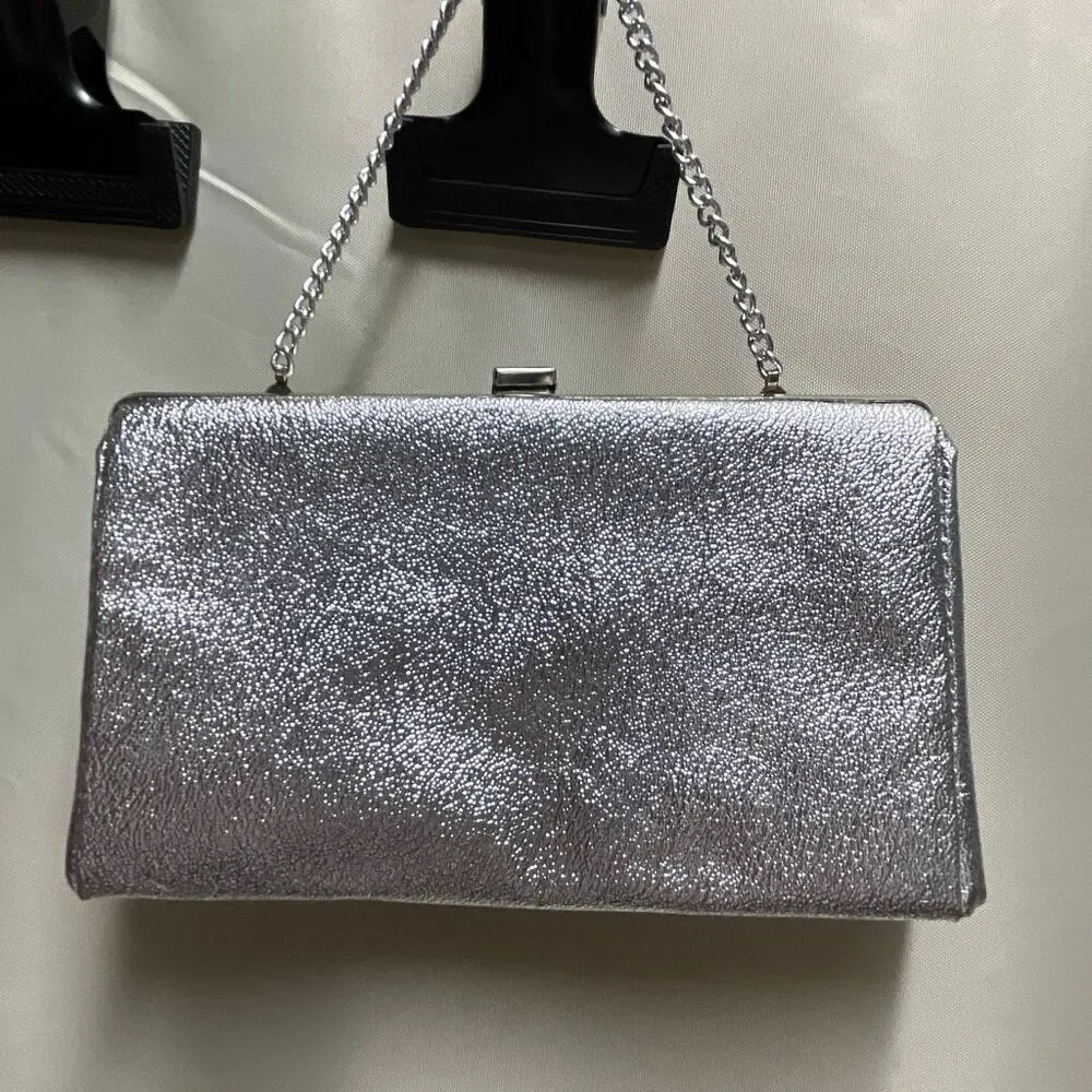 Vintage silver clutch with chain handle. Silver metallic